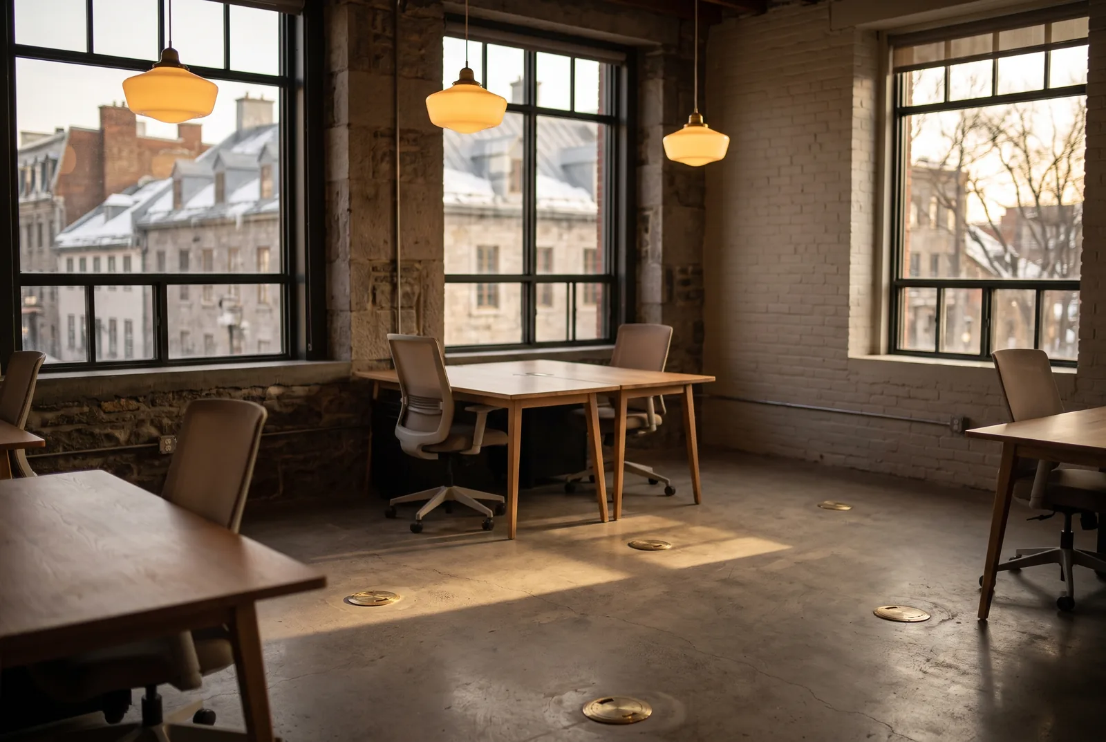 Finished office space, suspended lighting and floor outlets